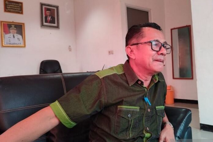 Kepala Disperindag Bujang HR