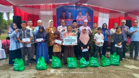 Hadiri Hari Bhakti Pendamping Desa di Bengkulu Utara, Ketua Baznas Yulkamra Salurkan 150 Paket Sembako dan 100 Amplop Santunan Dhuafa